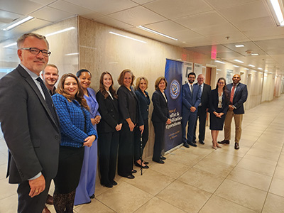 Dean Ozerdem at the State Department with officials and partners